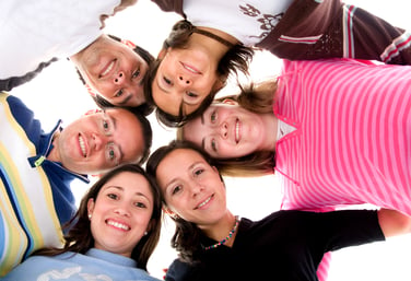 happy friends together in bright and colourful colors over white background